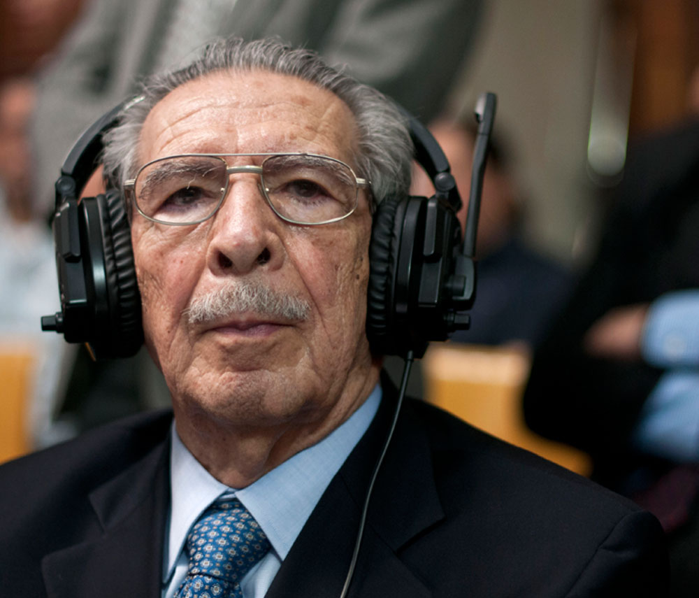Guatemala&#39;s former dictator Jose Efrain Rios Montt wears headphones as he listens to the verdict in his genocide trial in Guatemala City, Friday, May 10, ... - Jose-Efrain-Rios-Montt