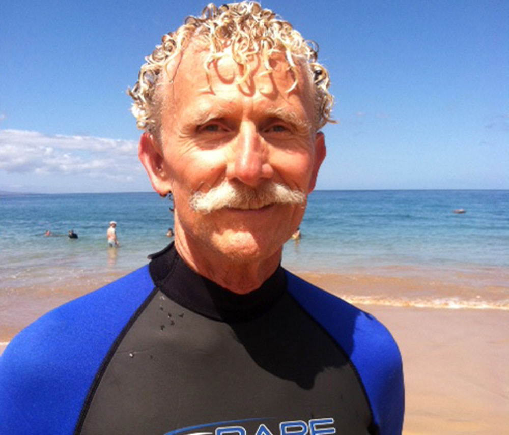 15, 2013 photo provided by Nicholas Grisaffi, Rick Moore poses at Palauea Beach in Makena on the island of Maui, Hawaii, a day after he jumped into the ... - Rick-Moore