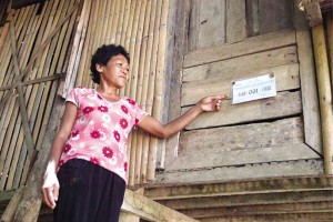 ONE OF THE houses in Barangay Alibunan in Calinog, Iloilo, which will be relocated when the mega dam is constructed, has been marked by the National Irrigation Administration. 