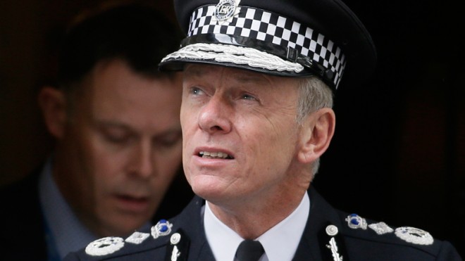 In this Thursday, May 23, 2013 file photo, the Commissioner of the London Metropolitan Police Bernard Hogan-Howe leaves 10 Downing Street in London, following a meeting of Cobra. The head of London’s police force says as many as five terror plots were foiled this year, as he warned of increasing pressure on resources amid the rising threat. Hogan-Howe told the BBC on Sunday, Nov. 23, 2014 that normally security services disrupt one plot annually. However, he says this year alone authorities have disrupted “we think four or five.’’(AP Photo/Alastair Grant, File)