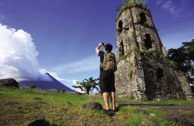 RESTIVE and volatile, Mayon Volcano is still the main tourist attraction of the Bicol region and Legazpi City. MARK ALVIC ESPLANA/INQUIRER SOUTHERN LUZON
