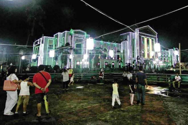 VISUAL DELIGHTColorful Christmas lights adorn the Provincial Capitol in Lucena City, attracting Quezon folk. DELFIN T. MALLARI JR./INQUIRER SOUTHERN LUZON