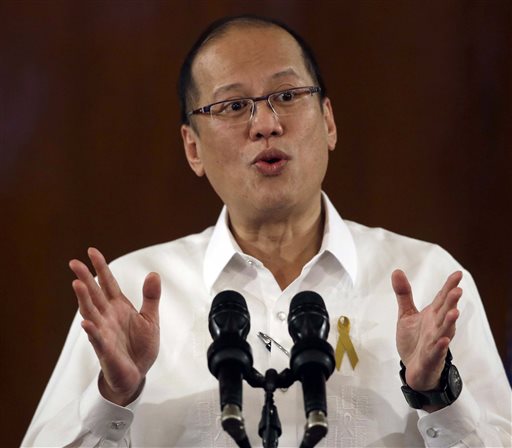 Philippine President Benigno Aquino III addresses the nation in a live broadcast Wednesday, Jan. 28, 2015 from Malacanang Palace in Manila, Philippines. Aquino declared a National Day of Mourning on Friday for the 44 anti-terror police commandos allegedly killed in a clash with Muslim guerrillas in southern Philippines last Sunday. (AP Photo/Bullit Marquez)