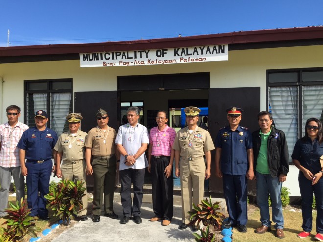 Military and local government officials, led by Wescom chief Vice Adm. Alexander Lopez, Palawan Vice Gov. Victorino Dennis Socrates and Kalayaan Mayor Eugenio Bito-onon, on Pag-asa Island