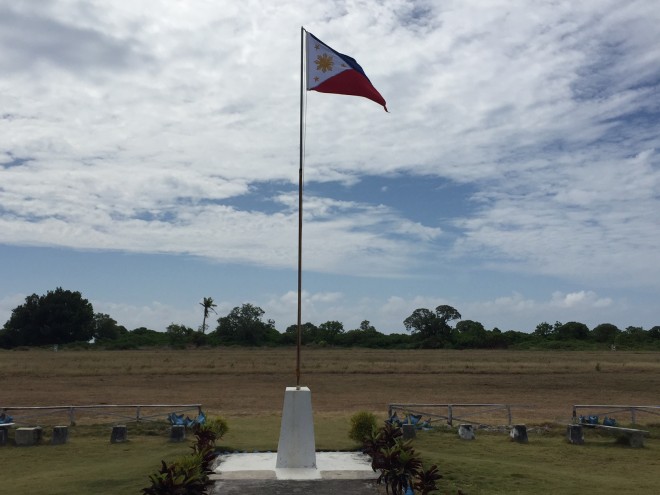 The Philippine flag flies in Pag-asa Island.