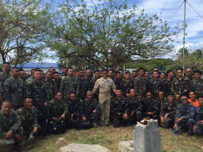 Vice Admiral Alexander Lopez with the soldiers stationed in Pag-asa Island
