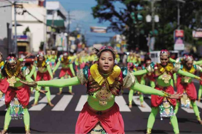 FESTIVAL OF FESTIVALS Street dancers perform during the opening of the monthlong Magayon Festival in Albay province in Legazpi City. PHOTOS BY MARK ALVIC ESPLANA
