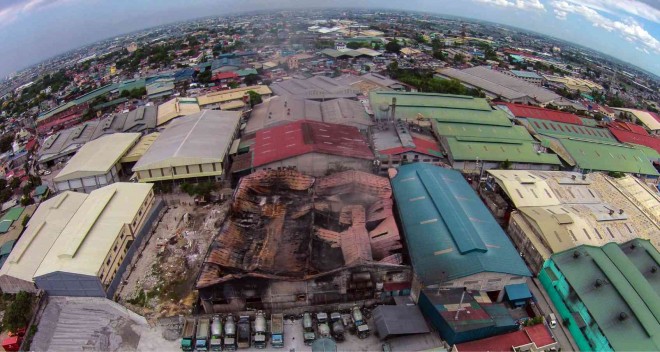 HEIGHT OF TRAGEDY   The May 13 inferno that engulfed the Kentex footwear factory has left a scar of death on Valenzuela City’s industrial landscape. REM ZAMORA 