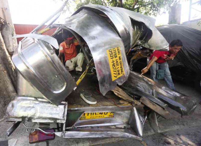 CRUSHED ON COASTAL The jeepney’s driver fled and his 28 injured passengers had to be pulled out carefully from this gnarled heap of metal after a three-vehicle smashup on Coastal Road in Las Piñas City on Tuesday. MARIANNE BERMUDEZ 