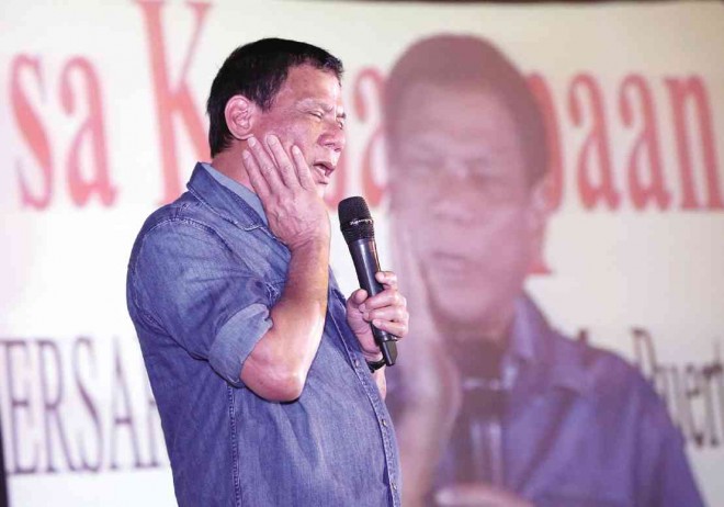 DAVAO City Mayor Rodrigo Duterte during the 33rd anniversary of the PDP Laban, a political party keen on fielding him as presidential candidate in 2016. MARIANNE BERMUDEZ 