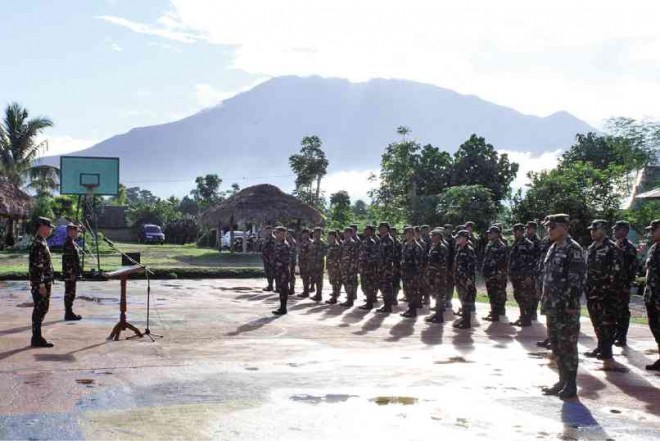 CAFGU FORMATION With Mt. Isarog on the backdrop, some of the members of the Citizen Armed Force Geographical Unit (Cafgu) members take formation at Camp Elias Angeles in Pili, Camarines Sur province.  JUAN ESCANDOR JR. 