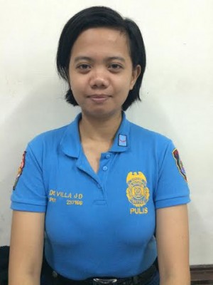 PO1 Judy Ann de Villa of the Navotas Police Station Special Patrol Unit has been lauded for stopping a bus holdup and arresting the suspect. (Photo by Jodee Agoncillo, INQUIRER.)