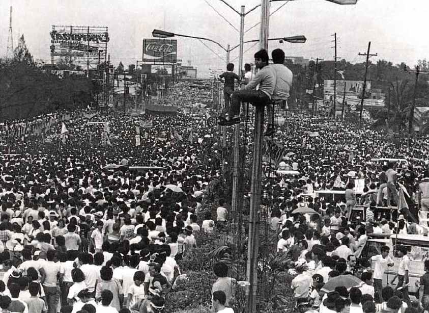 JOINT FORCES Thousands of people jammed Edsa on Feb. 23, 1986, and witnessed how then Defense Minister Juan Ponce Enrile crossed the street to Camp Crame, where he consolidated forces with then Lt. Gen. Fidel Ramos. PEOPLE POWER BOOK, THE PHILIPPINE REVOLUTION OF 1986