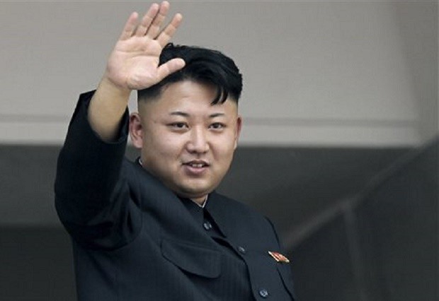 FILE - In this July 27, 2013 file photo, North Korea's leader Kim Jong Un waves to spectators and participants of a mass military parade celebrating the 60th anniversary of the Korean War armistice in Pyongyang, North Korea. President Barack Obama is "recklessly" spreading rumors of a Pyongyang-orchestrated cyberattack of Sony Pictures, North Korea says, as it warns of strikes against the White House, Pentagon and "the whole U.S. mainland, that cesspool of terrorism." (AP Photo/Wong Maye-E, File)