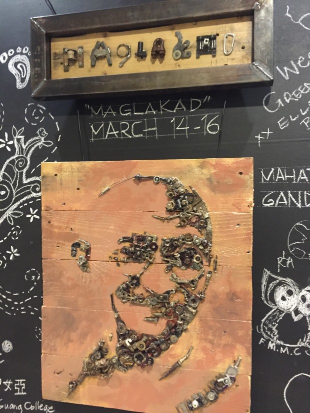 The centerpiece of the found objects art exhibit is a portrait of iconic Indian leader Mahatma Gandhi.