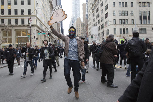 Demonstrators take to the street on during an anti Donald Trump protest, Saturday, March 19, 2016, in New York. Several hundred demonstrators gathered in New York City to protest Republican presidential hopeful Trump. AP