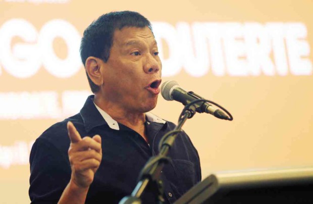 COMFORT ZONE Instead of dazzling business leaders with his economic agenda, presidential candidate and Davao City Mayor Rodrigo Duterte discusses his fight against criminality and his virility at the Makati Business Club forum on Wednesday. EDWIN BACASMAS