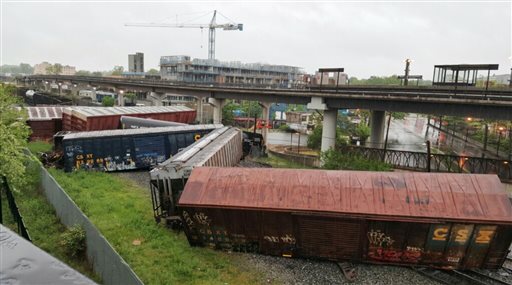 Several cars remain overturned after a CSX freight train derailed in Washington on Sunday, May 1, 2016. DC Fire and EMS via AP PHOTO
