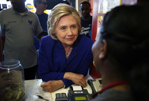 Democratic presidential candidate Hillary Clinton visits a restaurant, Monday, June 6, 2016, in Watts, Calif. AP Photo