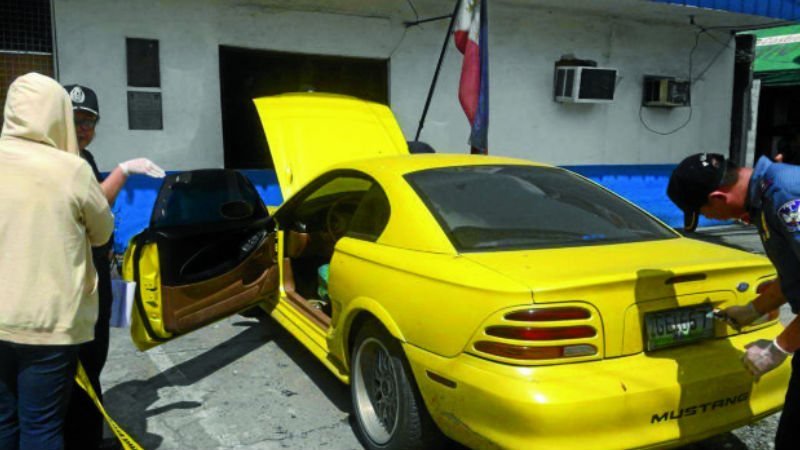 DRUG VEHICLE Angeles City policemen found a kilo of marijuana in a yellow FordMustang owned by Mark Anthony Fernandez. CONTRIBUTEDPHOTO