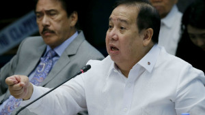 Senator Richard Gordon, chairman of the Philippine Senate's Committee on Justice and Human Rights, gestures as he questions witnesses at the resumption of the Philippine Senate probe on extrajudicial killings in the continuing "war on drugs" campaign of President Rodrigo Duterte Monday, Oct. 3, 2016 in suburban Pasay city, south of Manila, Philippines. The Philippine Senate's Committee on Justice and Human Rights, has invited witnesses to look into the possible human rights violations and extrajudicial killings in Davao city when Duterte was still the city mayor as well as the current "war on drugs" campaign by the present administration. (AP Photo/Bullit Marquez)