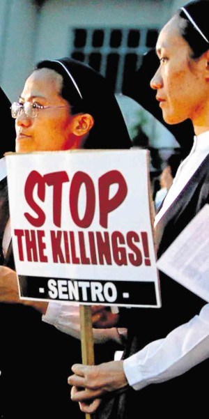 Nuns join a rally in Quezon City demanding a stop  to extrajudicial killings of drug suspects. The growing list of victims of those killings now include Joselito Pasaporte, a youth environment group member. —RICHARD REYES