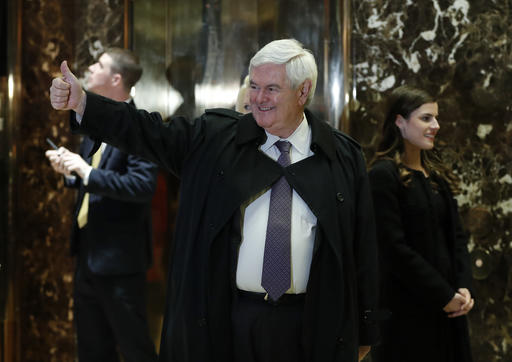 Former House Speaker Newt Gingrich gives the thumps-up as he arrives at Trump Tower, Monday, Nov. 21, 2016 in New York, to meet with President-elect Donald Trump. AP Photo