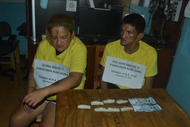 Gloria Santos and brother, PO1 John Santos were caught in a drug buy-bust by the Taguig City Police on Dec. 21, 2016. (Photo courtesy of the Taguig City Police's Station Anti-Illegal Drugs)