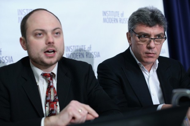 WASHINGTON, DC - JANUARY 30: Vladimir Kara-Murza (L), senior policy adviser at the Institute of Modern Russia, speaks as Russian opposition leader and former Deputy Prime Minister Boris Nemtsov (R) listens during a news conference on "Corruption and Abuse in Sochi Olympics" January 30, 2014 at the National Press Club in Washington, DC. The Institute of Modern Russia held the news conference to launch a new online interactive "corruption guide" to the Sochi Olympics and the release of a report on "Winter Olympics in the Sub-Tropics," which conducted by Nemtsov and Leonid Martynyuk, Russian journalist and opposition activist from the Krasnodar region.   Alex Wong/Getty Images/AFP