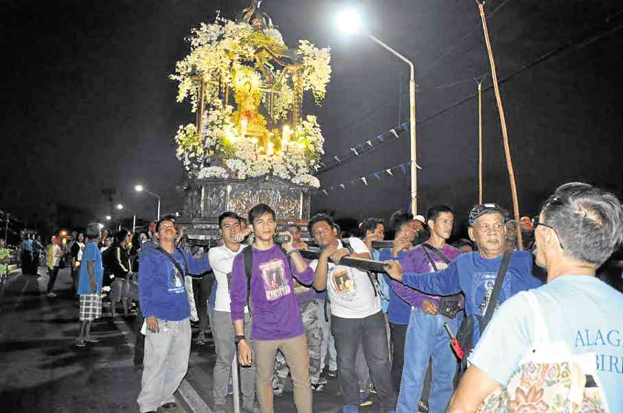Devotees honor Pakil's "Birhen ng Turumba" at the opening of this year's Anilag Festival in Laguna province.  --CONTRIBUTED PHOTO