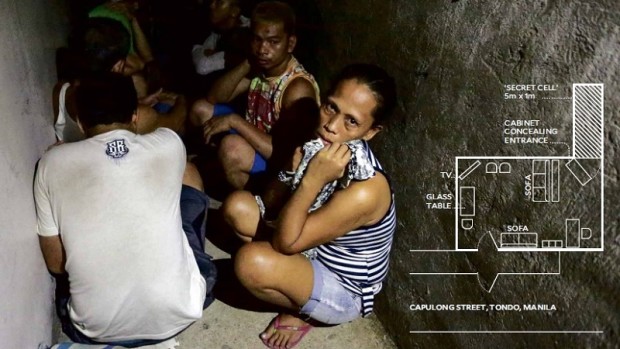 INTO THE LIGHT A woman detained in the secret jail of a Tondo police station squats with other drug suspects on the floor of a narrow cell found by a team from the Commission on Human Rights behind a wooden shelf (see sketch, inset). About a dozen men and women were found huddled inside on Thursday night. RAFFY LERMA