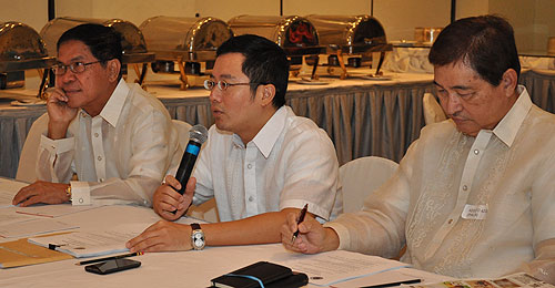 In this July 15, 2011 file photo, retired Sandinganbayan justice Edilberto Sandoval (left), then justice assistant secretary Gregory Sy and former Supreme Court Justice Adolf Azcuna join the experts' meeting to review the Philippines' criminal code. (Photo from the official website of the Department of justice at https://www.doj.gov.ph/criminal-code-committee.html)
