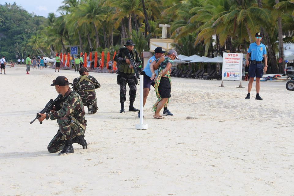 The Philippine Navy, Army, National Police Maritime Group and local security forces simulate their law enforcement response in case of a terrorist attack on Boracay Island, on May 22, 2017. (Photo courtesy of the Boracay Tourist Assistance Center)