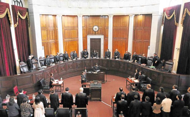 DUTERTE UPHELDThe Supreme Court justices, shown in this June 13 photo taken on the first day of oral arguments on President Duterte’s martial law declaration, have voted to affirm it. —MARIANNE BERMUDEZ