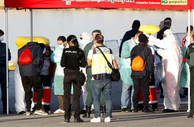 Rescue ships dock in Spain as migrant debate roils Europe