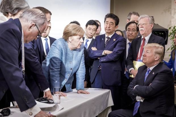 Merkel's spokesman offering 'no interpretation' of G7 pic