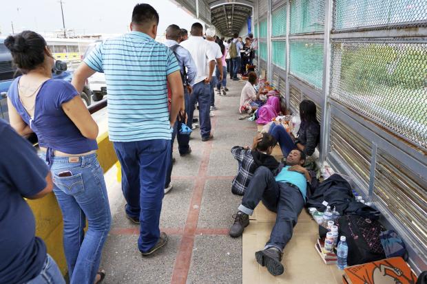 Migrants resting near US-Mexico border