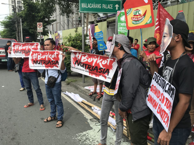 Labor groups converge at UST to protest contractualization