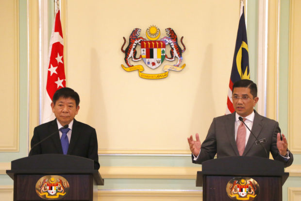Malaysia, Singapore to delay, not axe, high-speed rail link