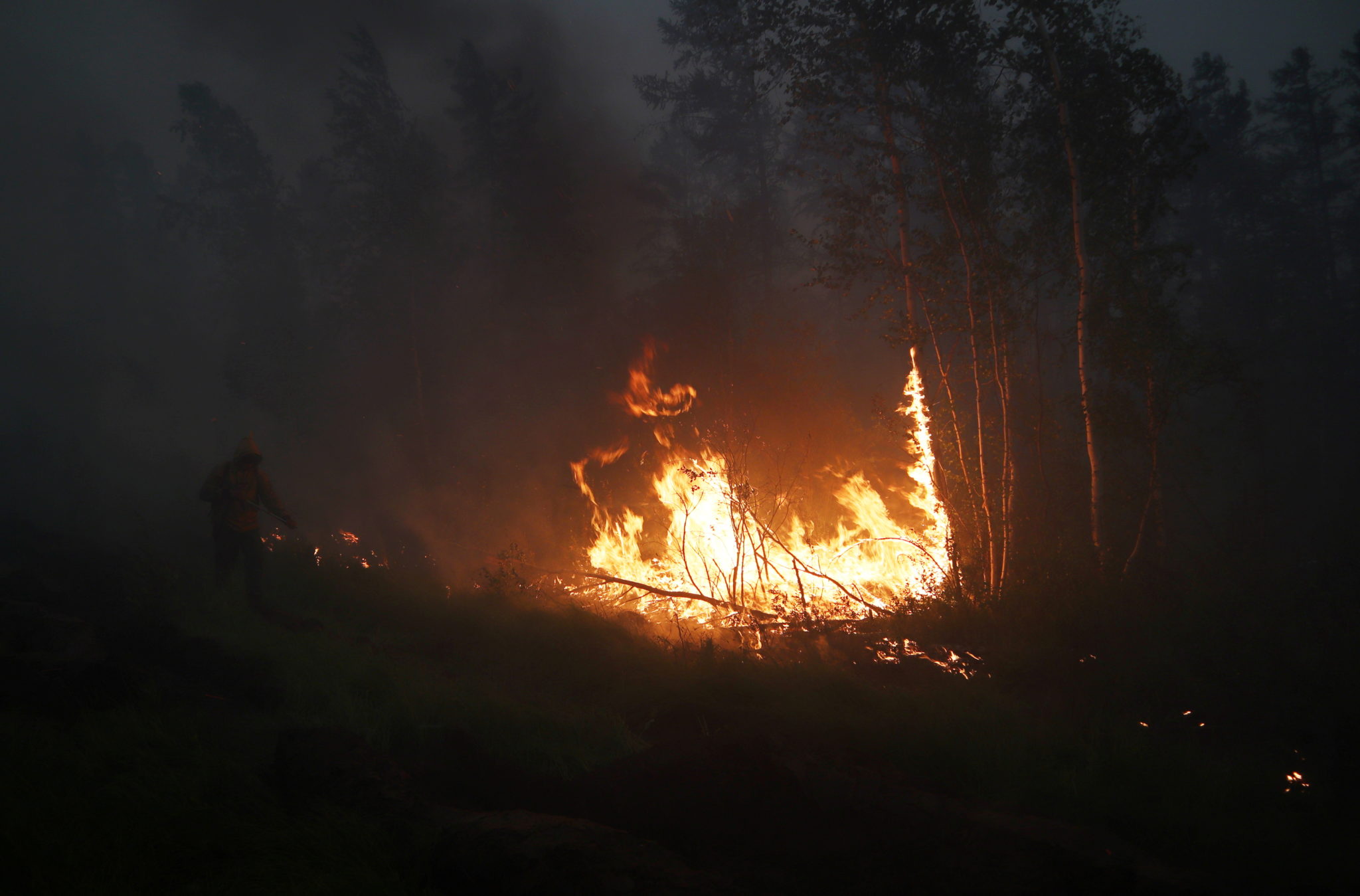 Russian Planes Seed Clouds As Raging Wildfires Near Siberian Power