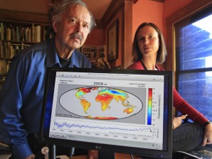 NOW A BELIEVER. In this Friday, Oct. 28, 2011 photo, Richard Muller, left, and his daughter, Elizabeth Muller, right, pose with a map from their study on climate at their home in Berkeley, Calif. A new study of Earth’s temperatures going back more than 200 years finds the same old story: It’s gotten hotter in the last 60 years. What’s different is the scientist behind the latest study, Richard Muller. The California physicist was doubtful of what climate scientists have been saying - until he did his own research, partly funded by climate change skeptics. Elizabeth Muller, co-founder and executive director of the Berkeley Earth Surface Temperature Study, ran the study. AP Photo/Paul Sakuma