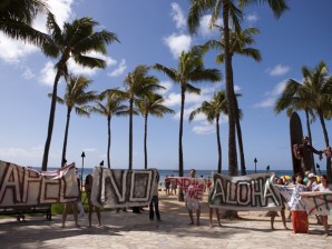 Demonstrators gather against the APEC summit in Waikiki, Honolulu on Saturday, November 12, 2011. MARCO GARCIA/AP PHOTO