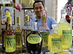 SHERWIN Raca, officer in charge of the Mauban Product Development, shows colorful native products of Mauban town in Quezon. DELFIN T. MALLARI JR.