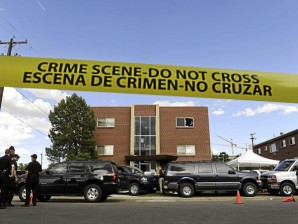Police surround the apartment of James Holmes, the suspect in the Colorado theater shooting, on July 21, 2012 in Aurora, Colorado. Numerous explosive devices were found in the apartment and successfully disarmed. According to reports, 12 people have been killed in the shooting and over 59 injured including 9 in critical condition.  AFP