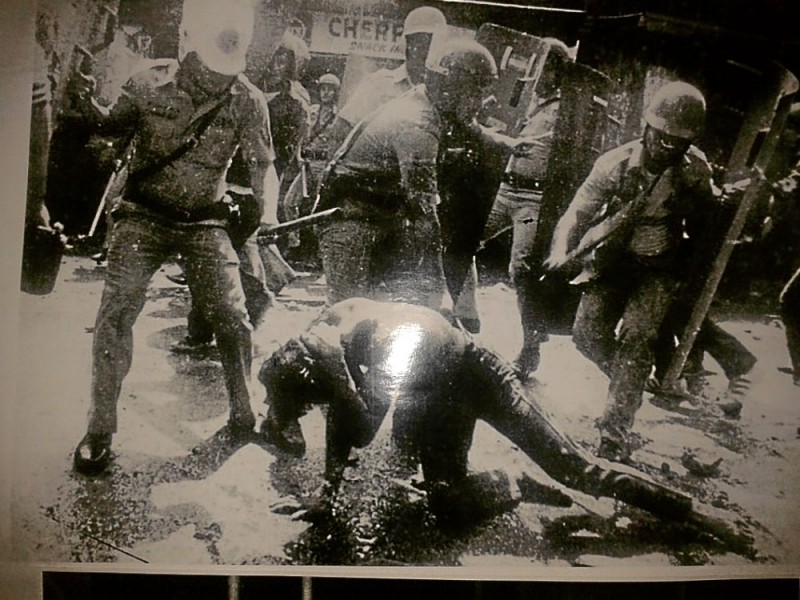 THIS PHOTO of police brutality on protesters is among those displayed in the exhibit, “Himagsik at Protesta,” put up by Karapatan at the University of the Philippines Library until Sept. 21 for the 40th anniversary of the declaration of martial rule. PHOTO REPRODUCTION BY TONETTE OREJAS