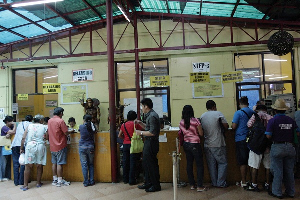 People line up in Manila to get copies of their birth certificate