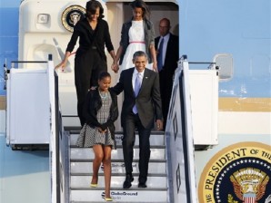 US President Barack Obama and first lady Michelle Obama and their daughters Sasha, left, and Malia disembark from Air Force One at the Tegel airport in Berlin Tuesday, June 18, 2013. Obama arrived for a two-day official visit to Germany. AP/Michael Probst