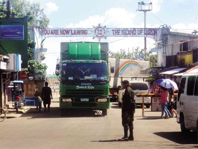 A cargo truck, one of hundreds of vehicles bound for Samar and Leyte provinces,  prepares to board a ferry in Matnog, Sorsogon province, for the mercy trip to the Visayas  on Friday. FILE PHOTO FROM PNP INFORMATION OFFICE-BICOL