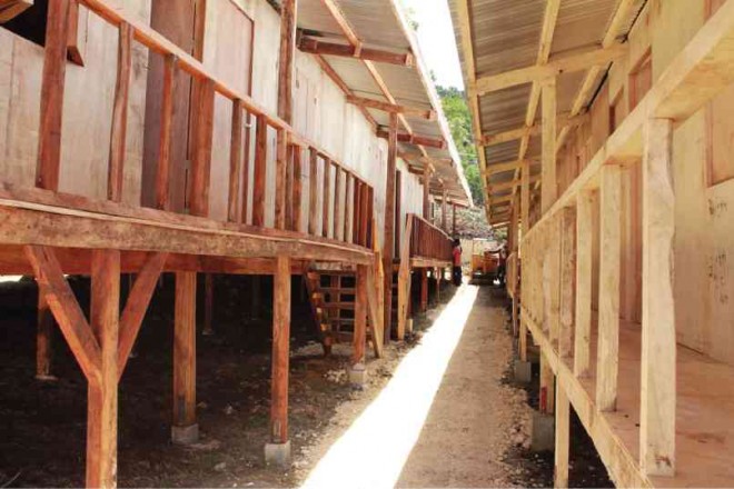 A TOTAL of 20 bunkhouses are being built by the Department of Public Works and Highways for quake survivors  in Bohol province. The department is targeting a total of 100 bunkhouses. CARMEL MATUS/INQUIRER VISAYAS 