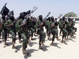 Hundreds of newly trained al-Shabab fighters perform military exercises in the Lafofe area some 18 km south of Mogadishu in Somalia in this Feb. 17, 2011, file photo, . AP